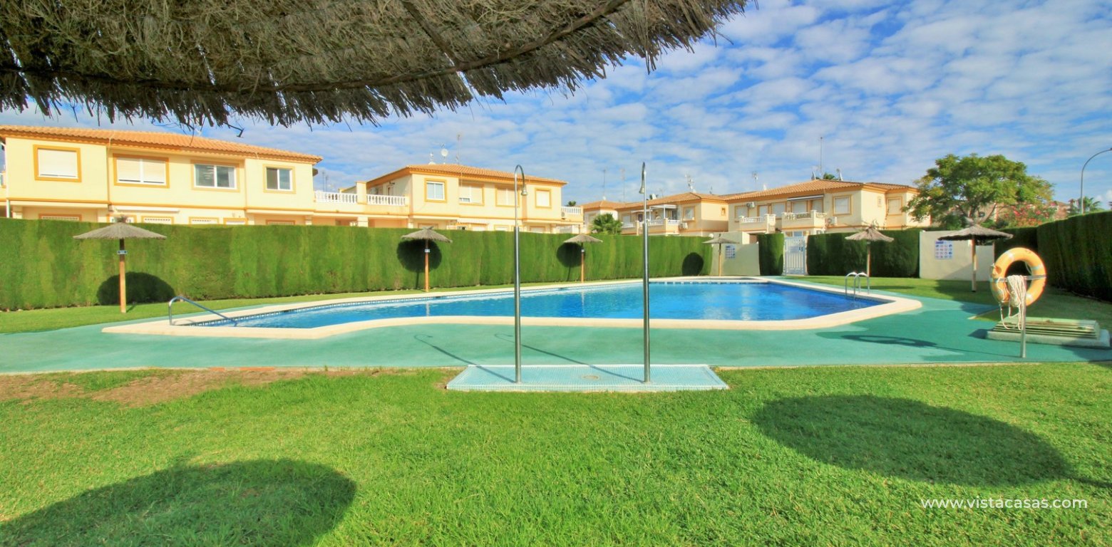 Top floor apartment for sale Sol de Mar Playa Flamenca communal garden
