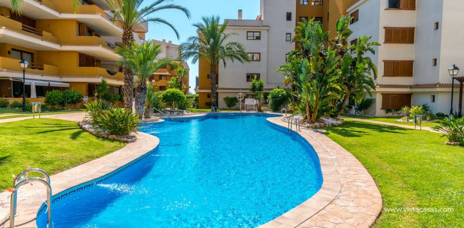 Punta Prima La Entrada 2 bed apartment for sale communal swimming pool