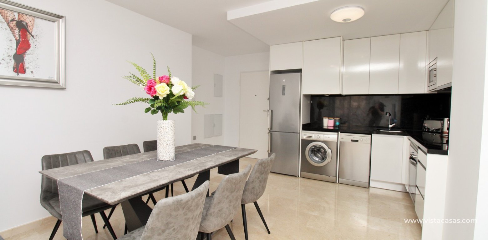 2 Bedroom Apartment with Pool View for sale Sungolf Beach Villamartin diner ktichen