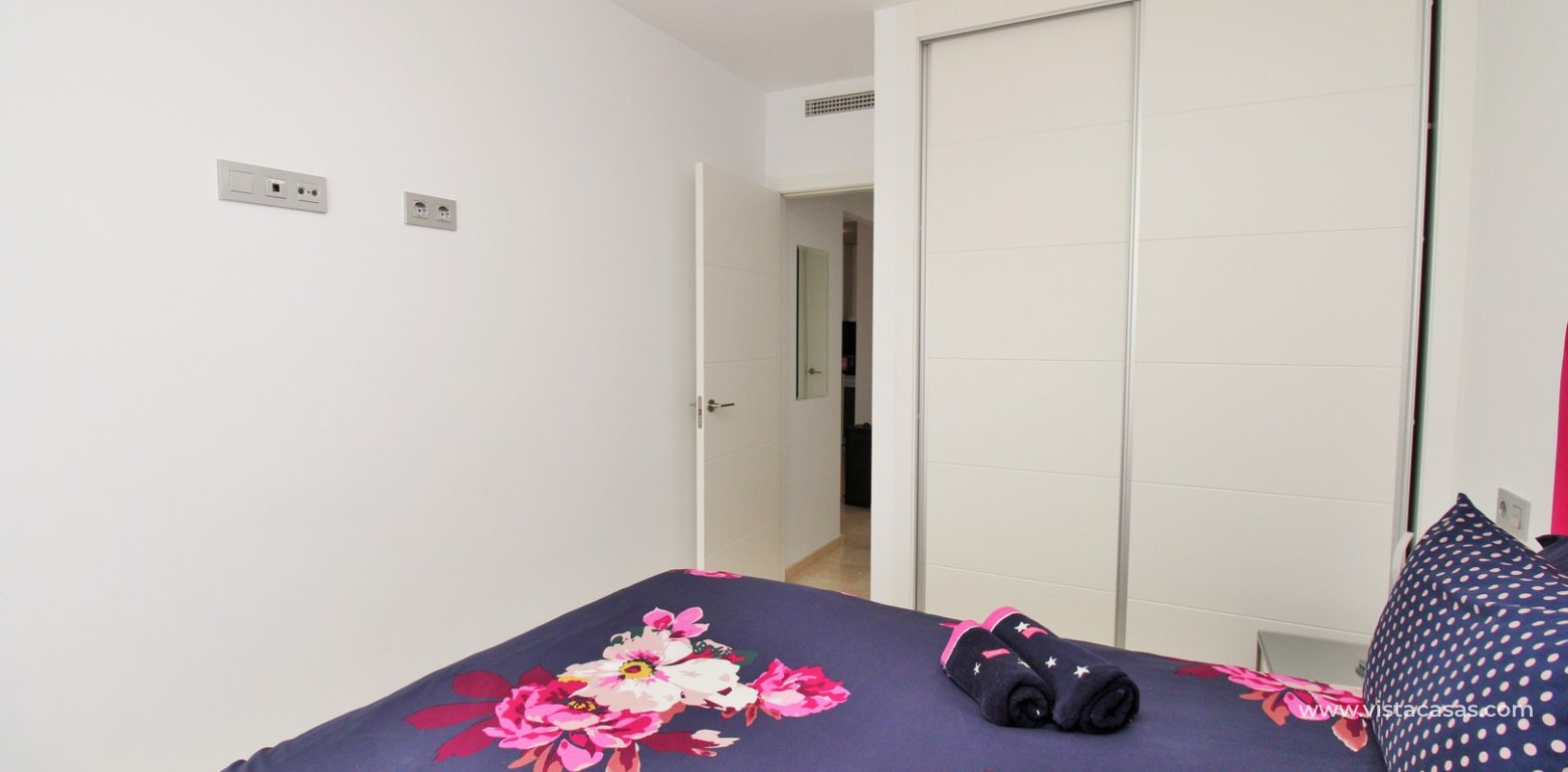 2 Bedroom Apartment with Pool View for sale Sungolf Beach Villamartin master bedroom fitted wardrobes