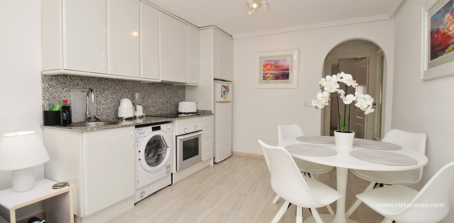 Bungalow with roof terrace for sale Villamartin kitchen diner