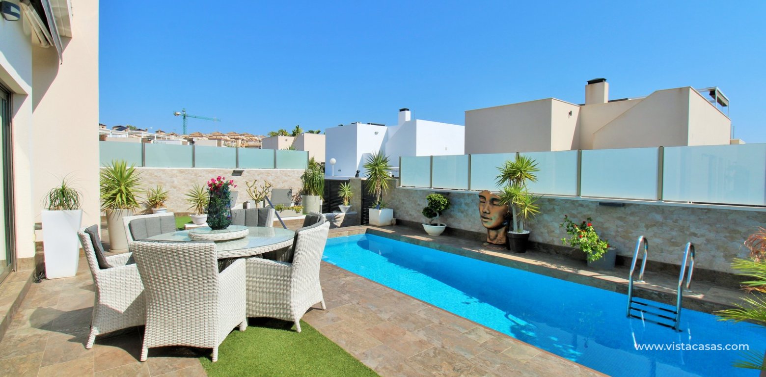 Modern 4-Bed Villa with Pool & Solarium in Villamartin seating area