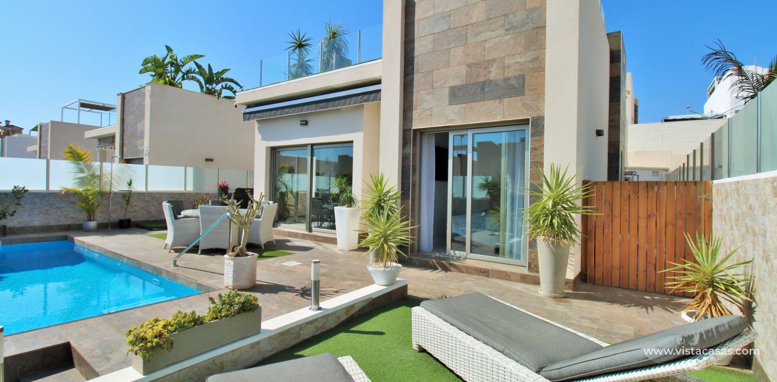 Modern 4-Bed Villa with Pool & Solarium in Villamartin front