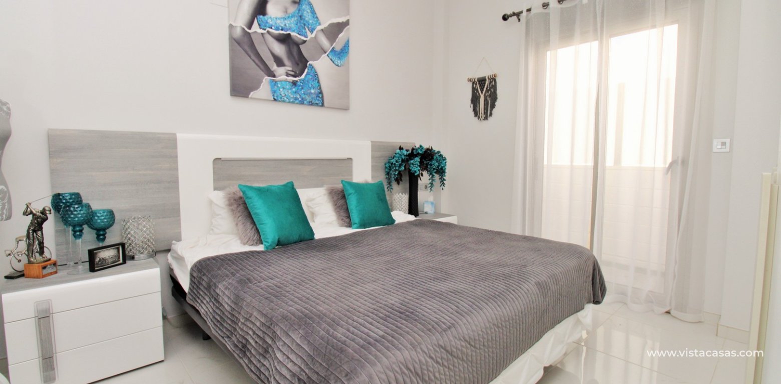 Modern 4-Bed Villa with Pool & Solarium in Villamartin master bedroom