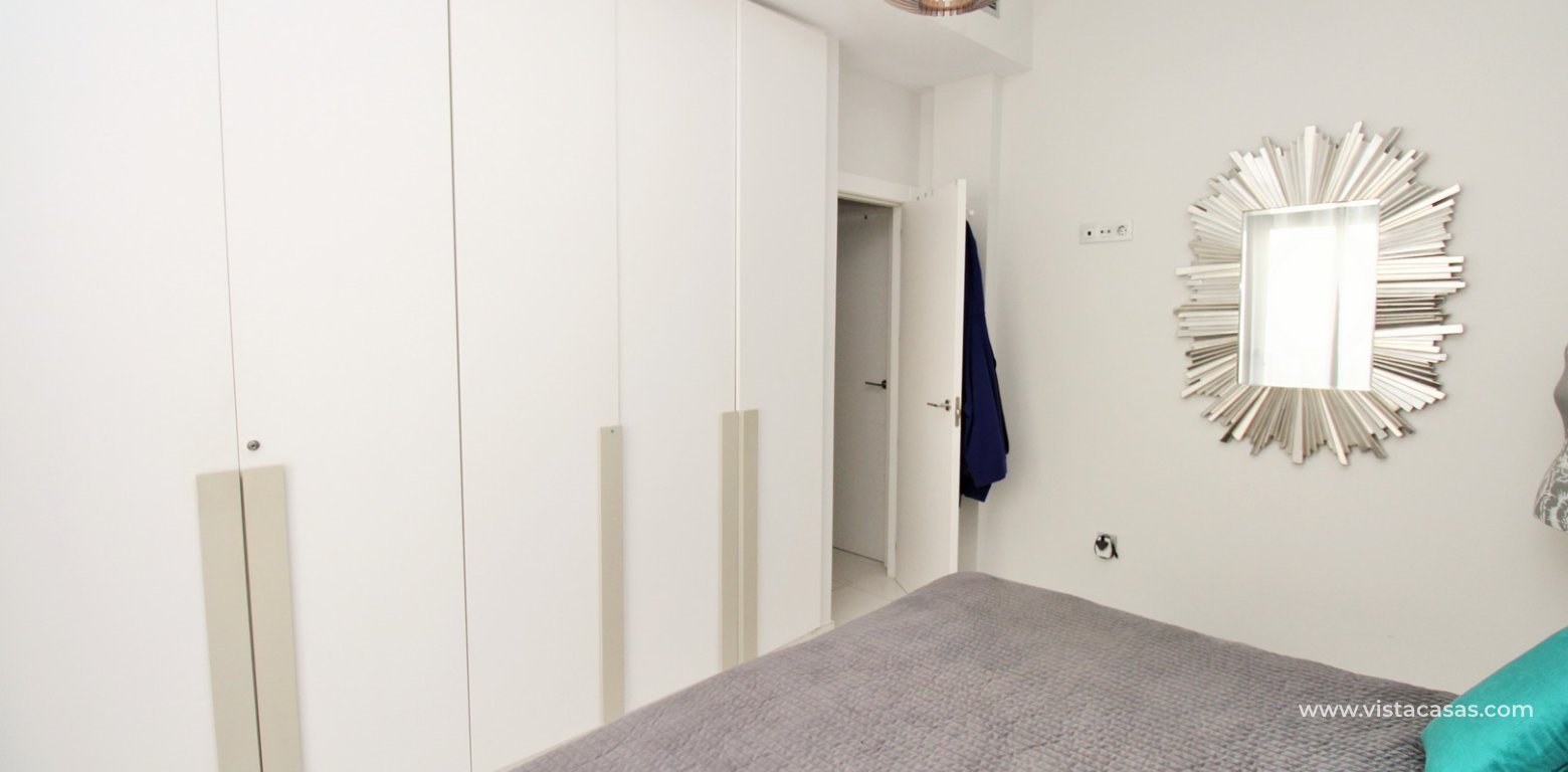 Modern 4-Bed Villa with Pool & Solarium in Villamartin master bedroom fitted wardrobes