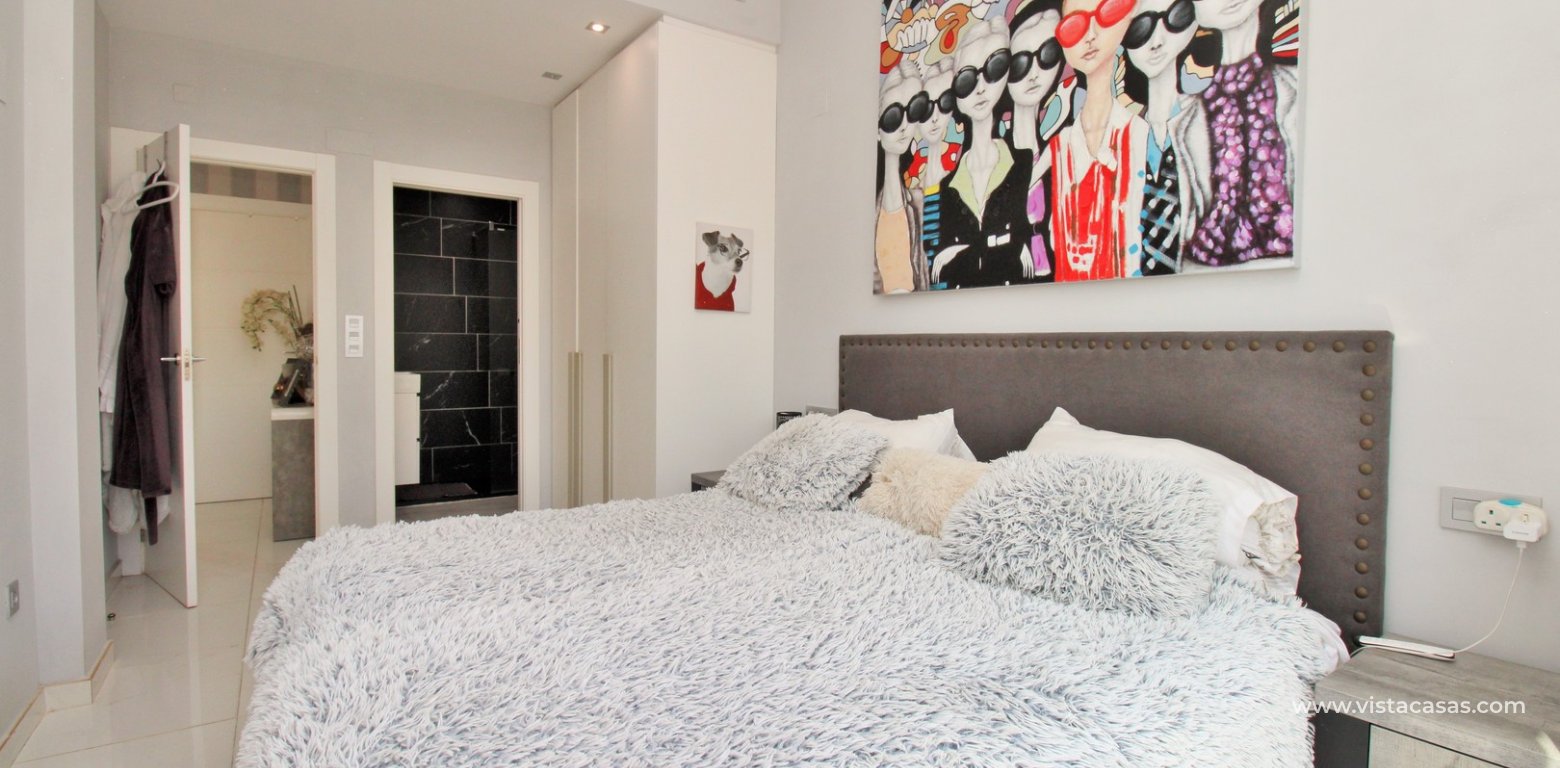 Modern 4-Bed Villa with Pool & Solarium in Villamartin master bedroom fitted wardrobes