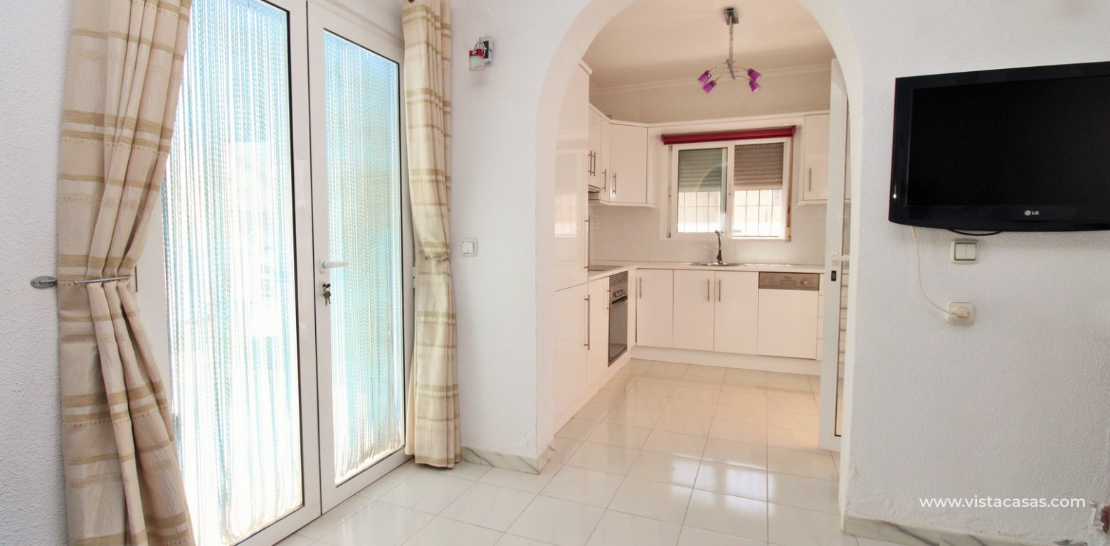 3-Bedroom Detached Villa with Private Pool in Eagles Nest, Near Villamartin Plaza & Golf courtyard access kitchen