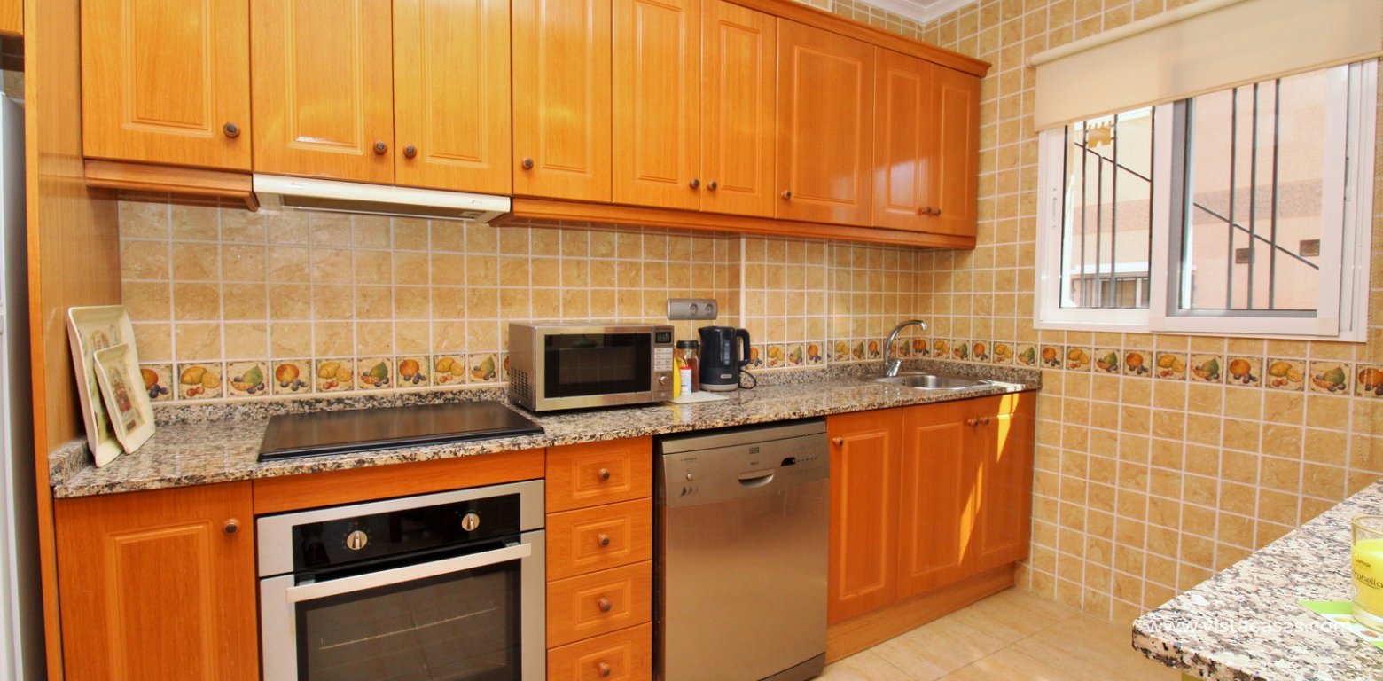 3-Bed Quad House in Villamartin Torregolf IV Pool View kitchen 2