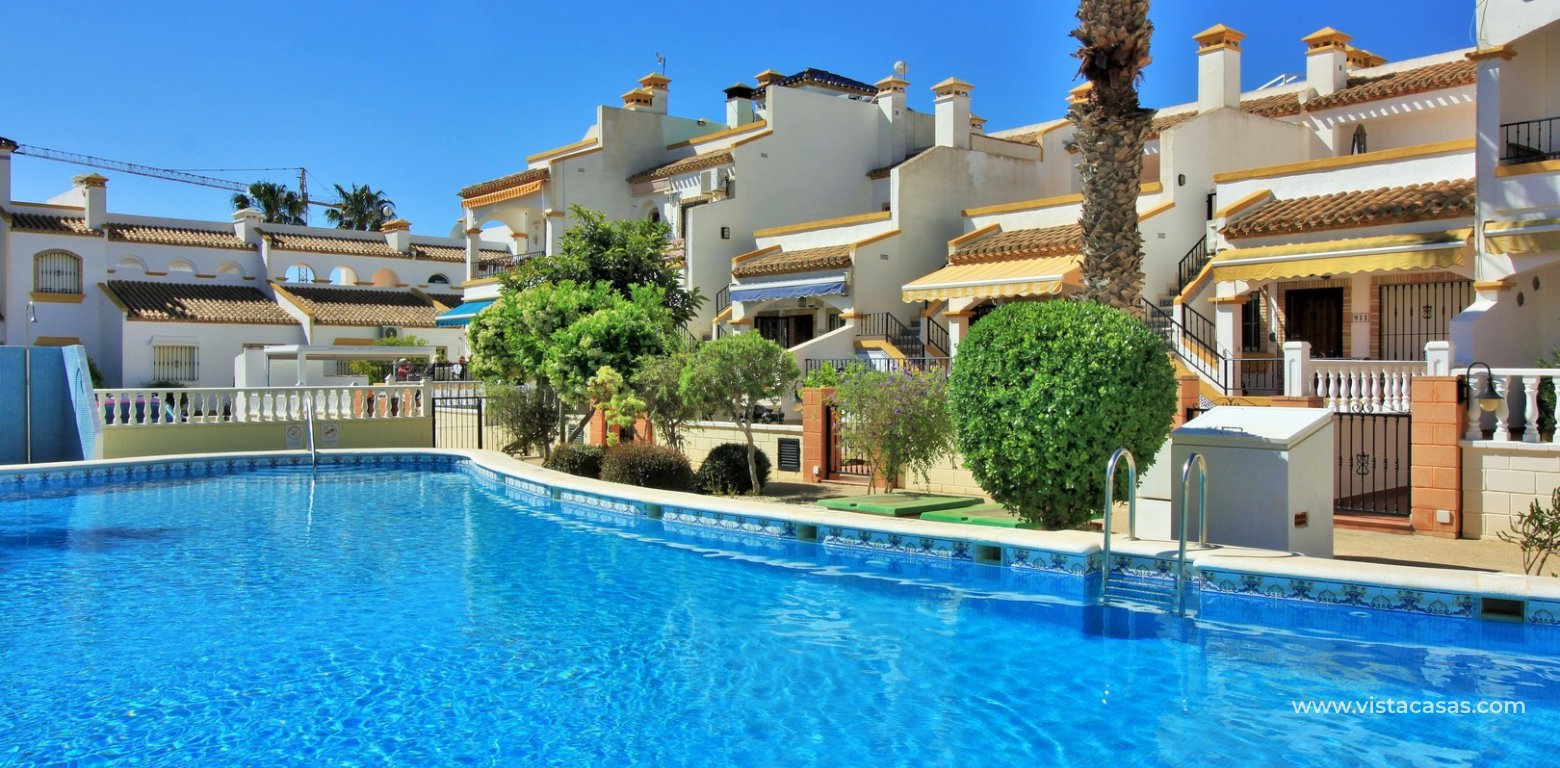 Buhardilla Townhouse for Sale in R19 Los Dolses communal swimming pool