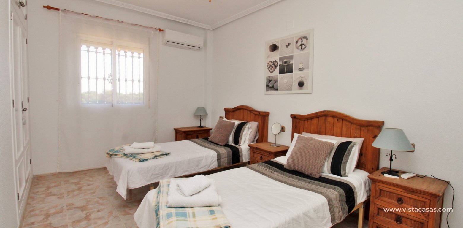 4-Bed Villa with Sea Views & Basement For Sale in Playa Flamenca twin bedroom