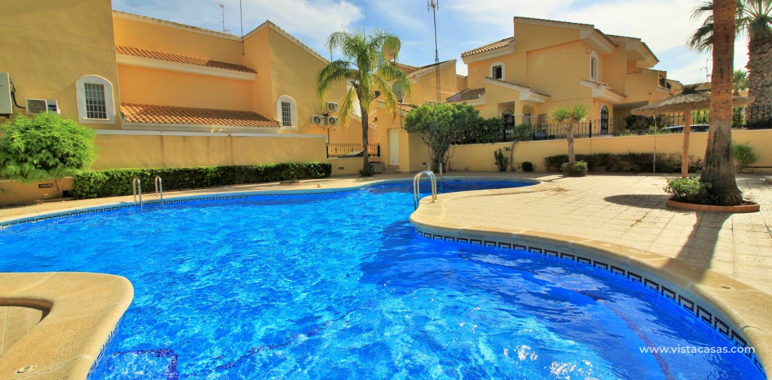 3 Bed Villa with Private Pool in Costa Flamenca Golf Los Dolses communal pool