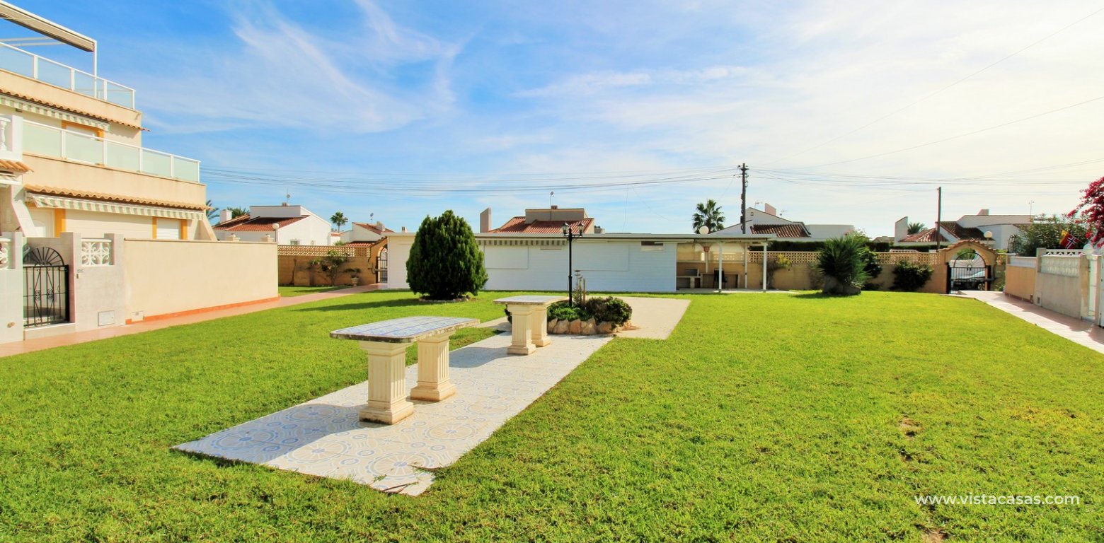 Bungalow with Sunny Terrace for Sale in La Chismosa communal garden