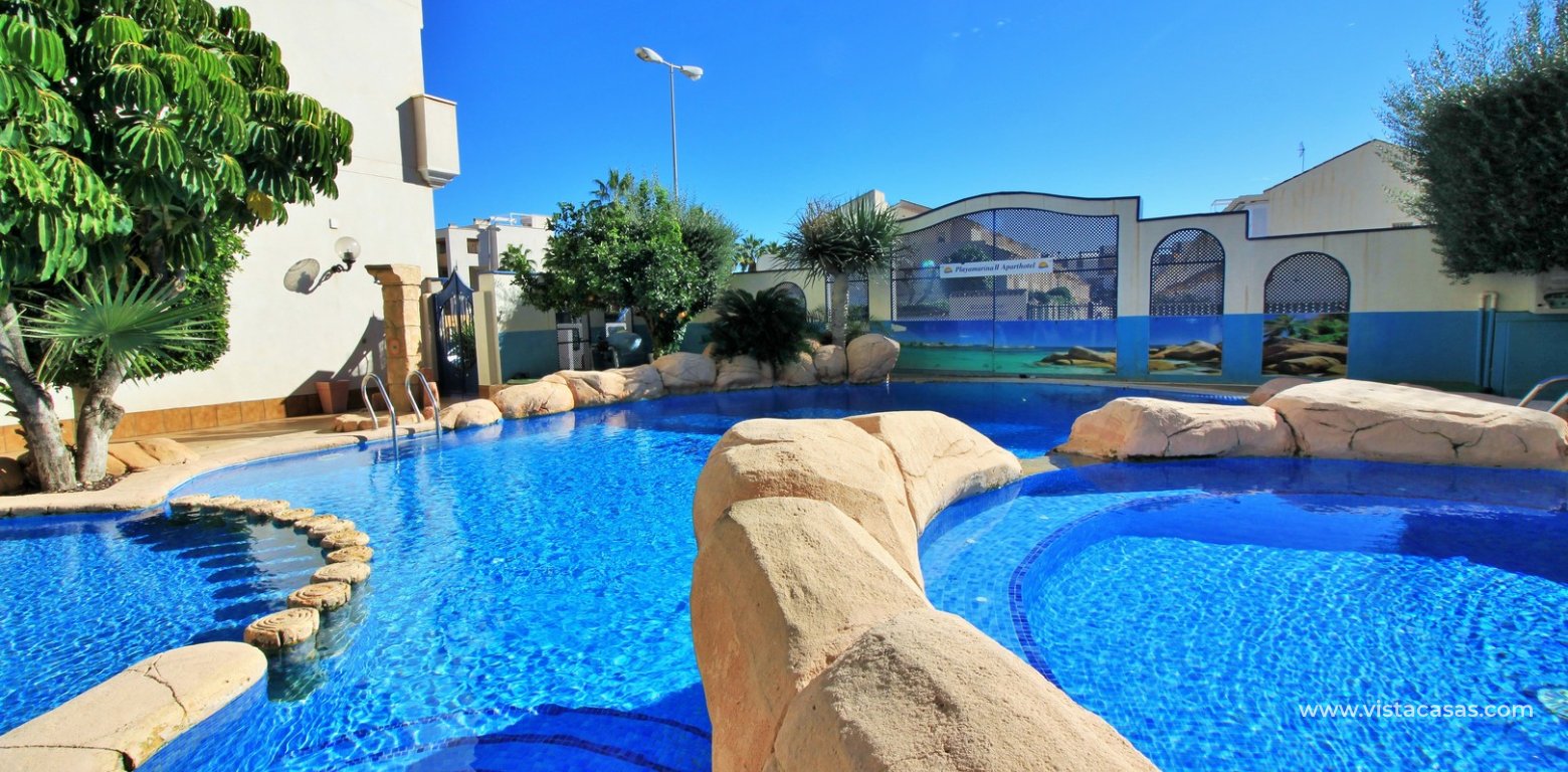 Beachside 2 Bed Apartment in Playa Marina 2 Cabo Roig communal pool