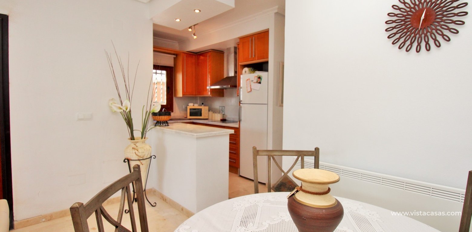 Pau 8 Villamartin 2 Bed Top-Floor Home with Pool Views dining area