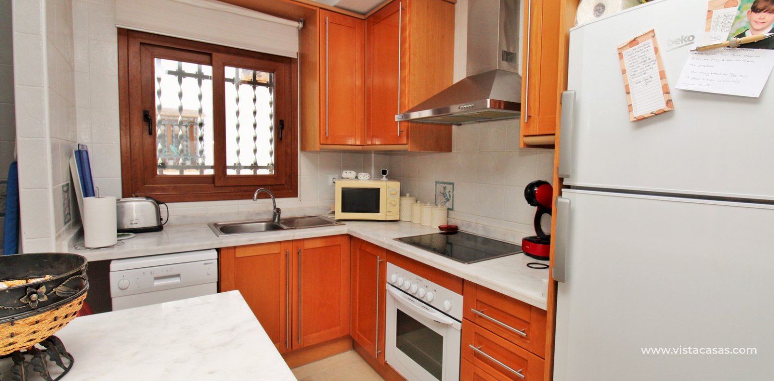 Pau 8 Villamartin 2 Bed Top-Floor Home with Pool Views kitchen