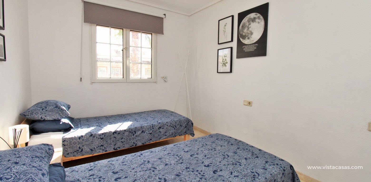 South Facing 2 Bed Apartment For Sale Near Villamartin Golf twin bedroom