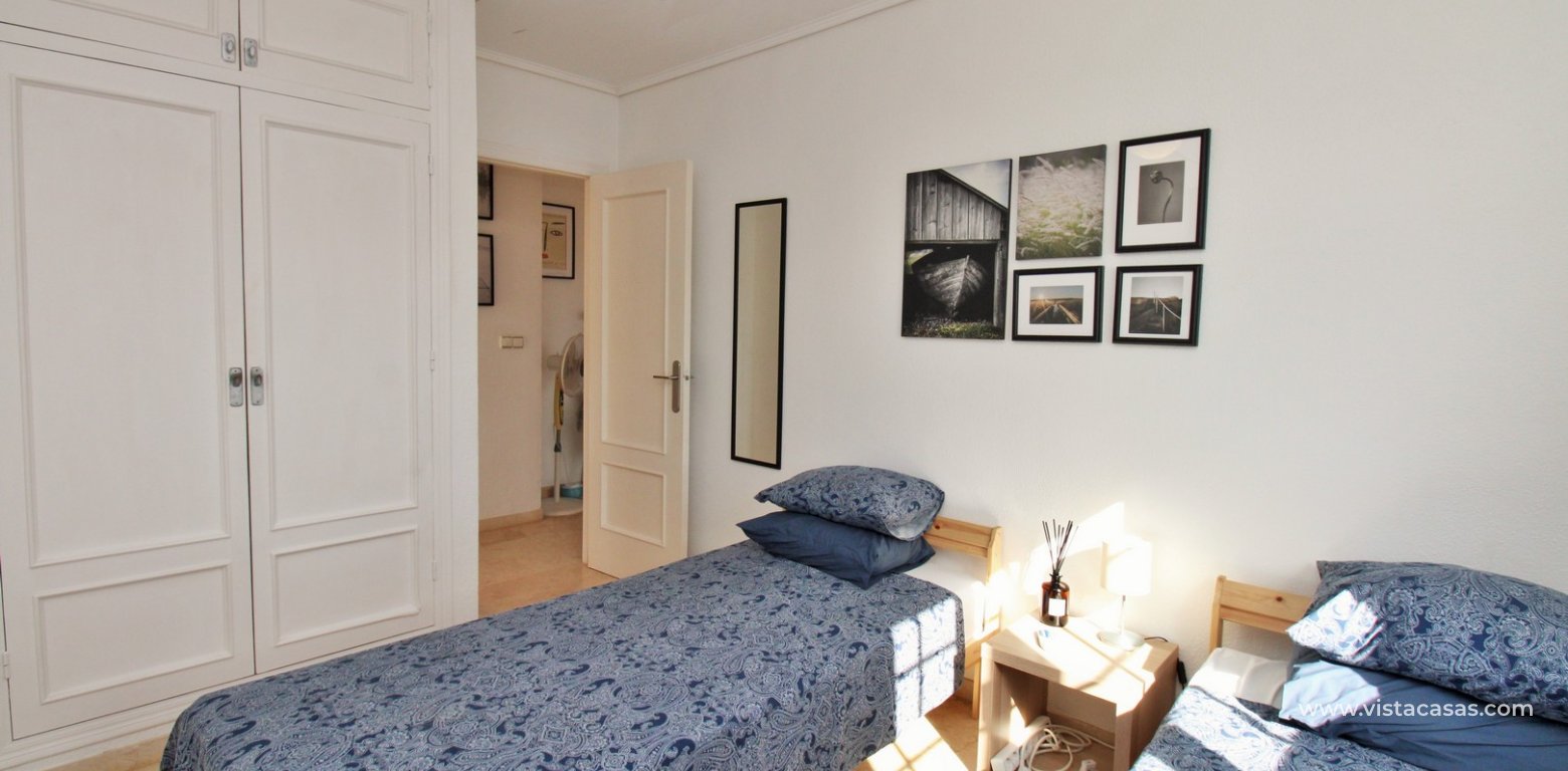 South Facing 2 Bed Apartment For Sale Near Villamartin Golf twin bedroom fitted wardrobes