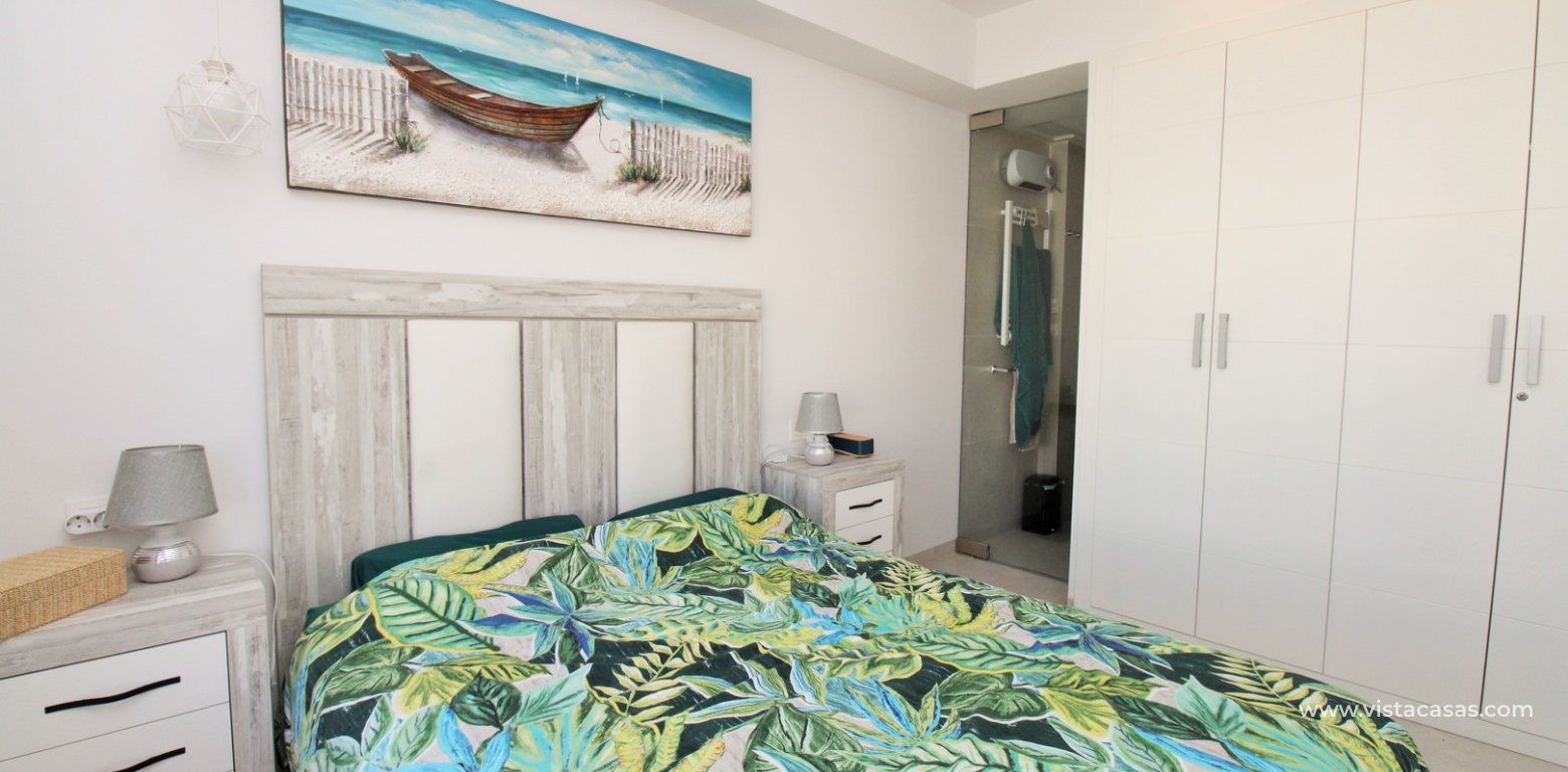 Modern 2 Bed Townhouse with Private Pool in Villamartin master bedroom fitted wardrobes