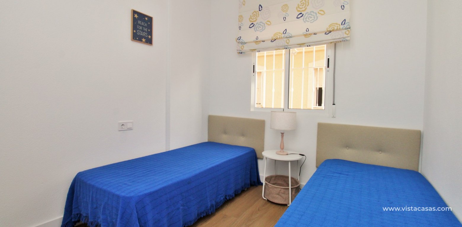 Refurbished Townhouse with Solarium For Sale in Florida Golf twin bedroom