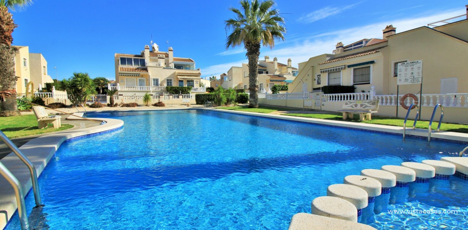 3 Bedroom Corner Townhouse For Sale in Jumilla Playa Flamenca pool