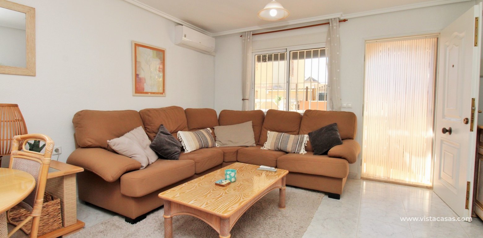 South Facing 3 Bed Townhouse For Sale in Paola II Playa Flamenca lounge 4