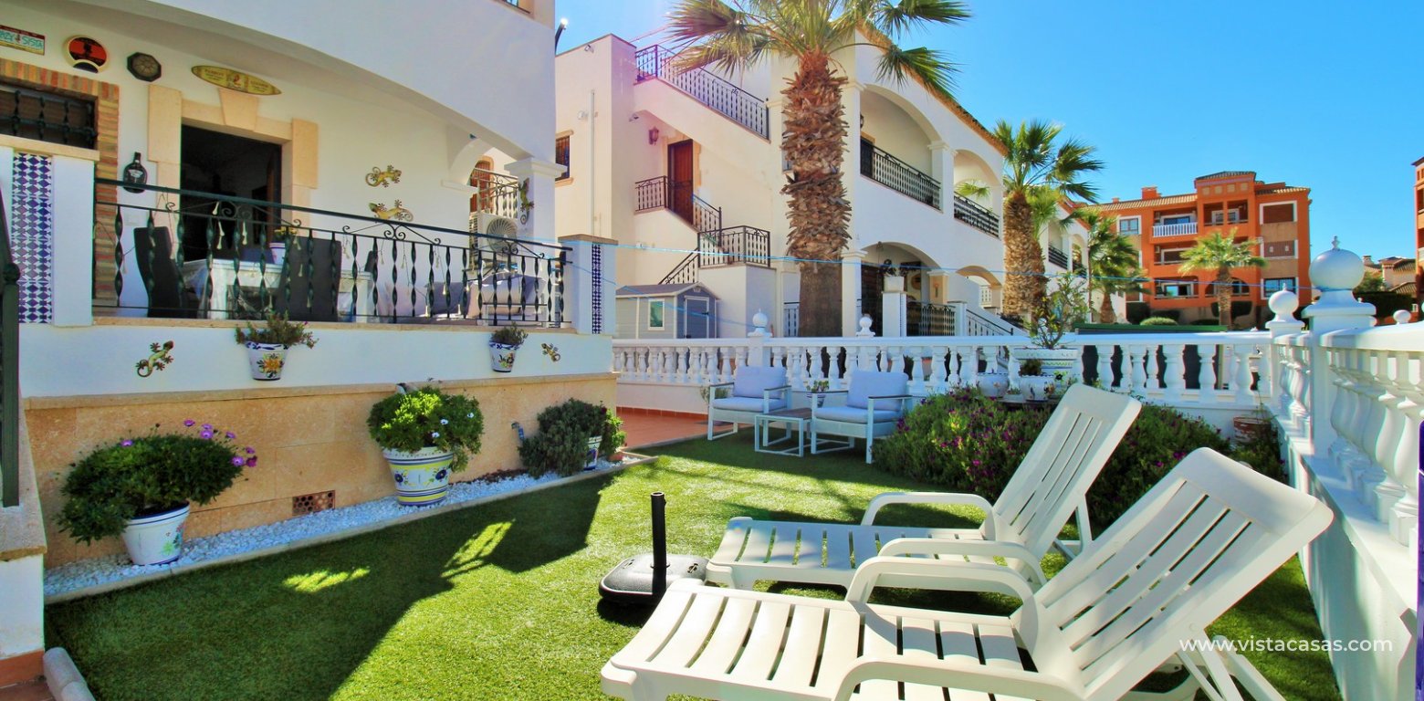 Poolfront 2 Bed Apartment For Sale in Villamartin Pau 8 front garden