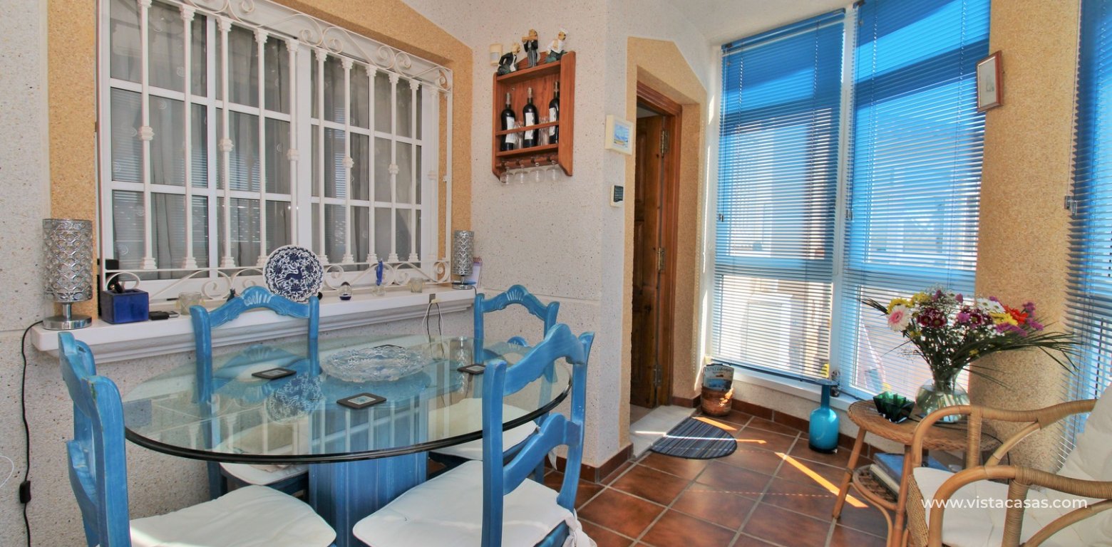 South-Facing 2 Bed Bungalow For Sale in Loma Golf Villamartin enclosed terrace