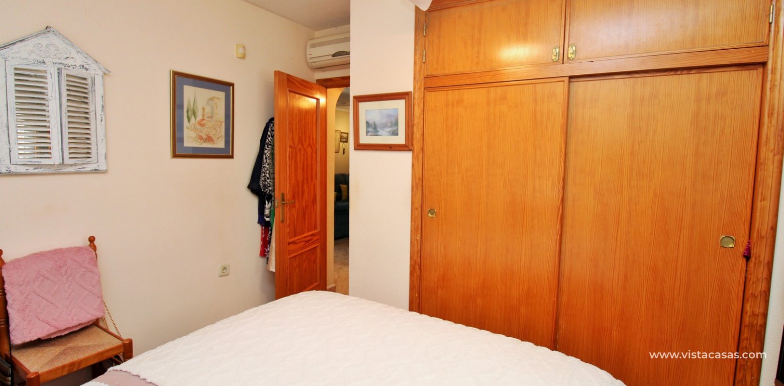 South-Facing 2 Bed Bungalow For Sale in Loma Golf Villamartin master bedroom fitted wardrobes