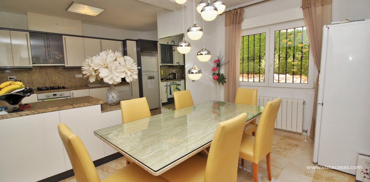 Detached villa for sale with private pool in Las Rambas golf dining area