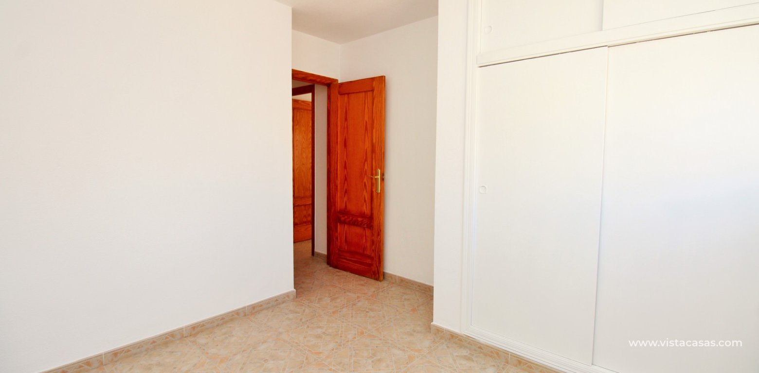 South-Facing 2 Bedroom Townhouse in Playa Flamenca Perla del Mar 2 master bedroom fitted wardrobes