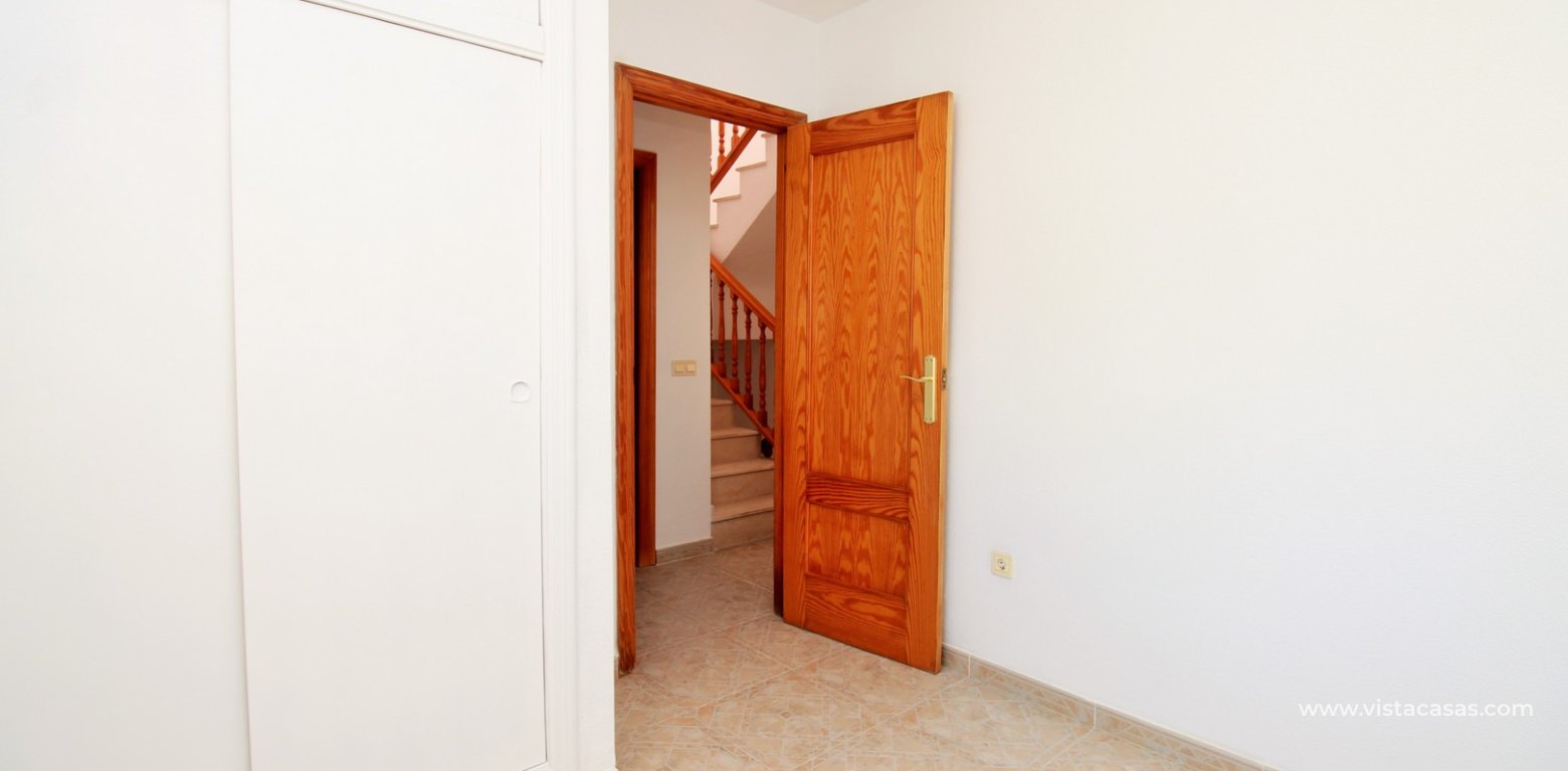 South-Facing 2 Bedroom Townhouse in Playa Flamenca Perla del Mar 2 twin bedroom fitted wardrobes