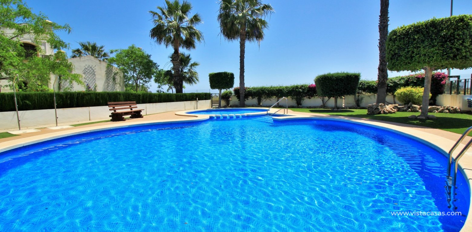South-Facing 3 Bedroom Buhardilla Townhouse For Sale In R13 Pau 8 communal pool