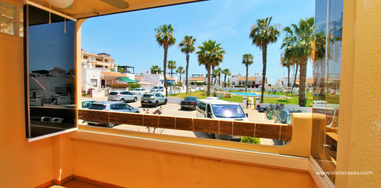 Ground Floor Apartment for Sale in Jumilla II Playa Flamenca balcony pool view