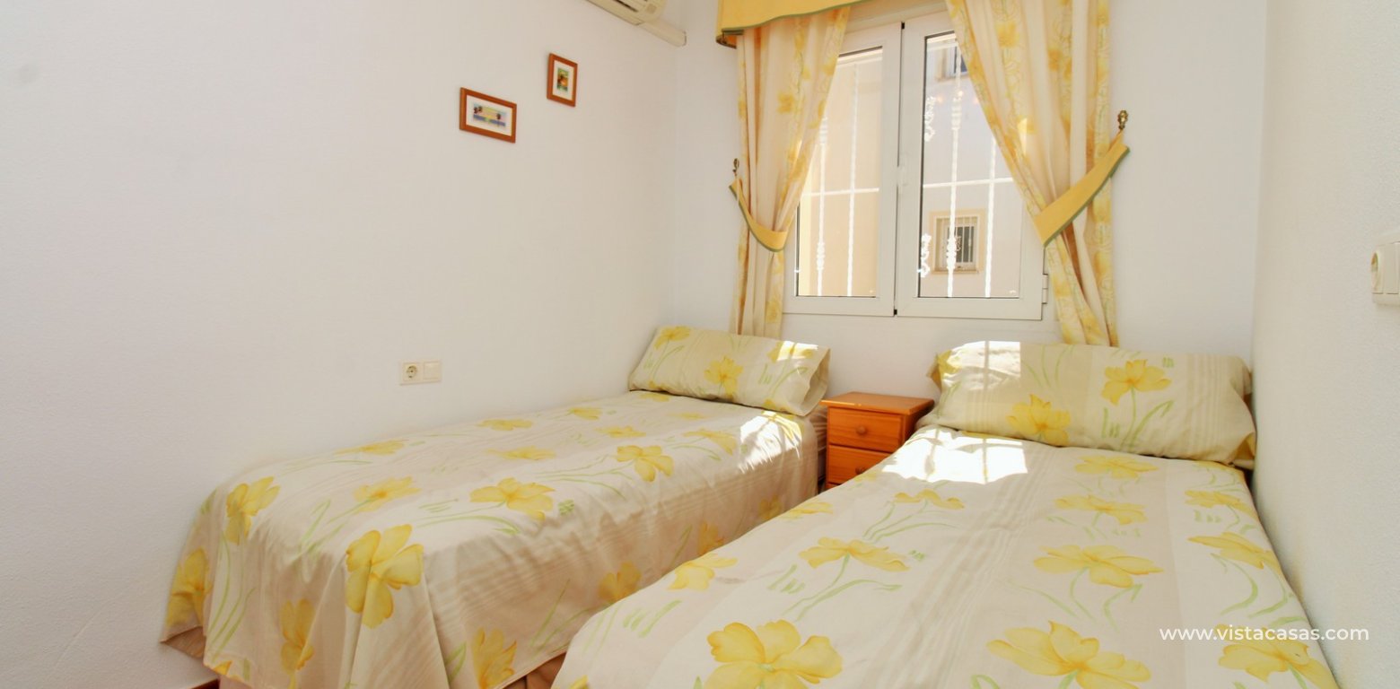 Top Floor Apartment For Sale In Panorama Golf twin bedroom