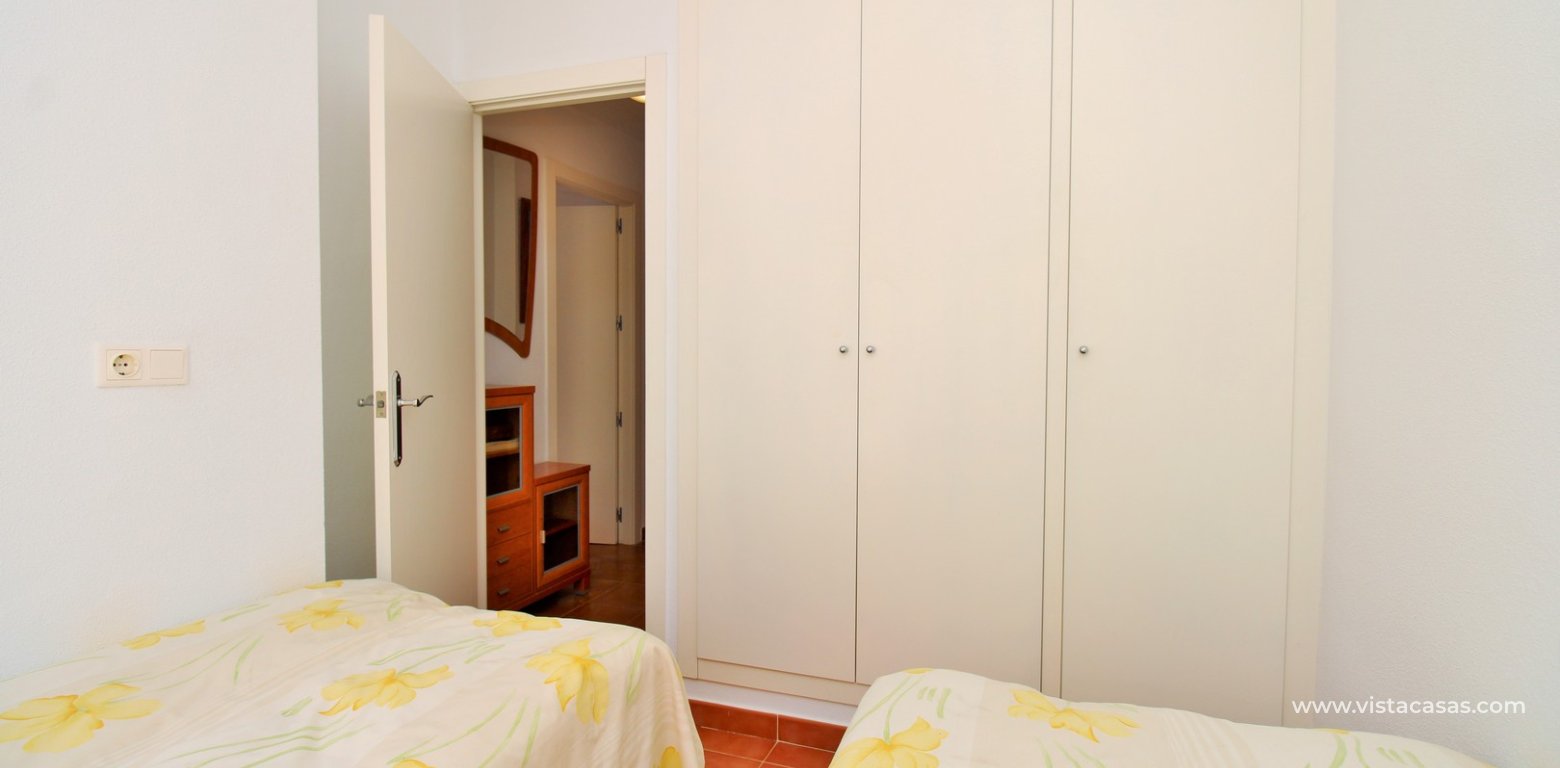 Top Floor Apartment For Sale In Panorama Golf twin bedroom fitted wardrobes