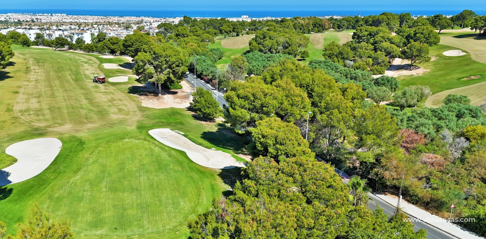 Top Floor Apartment For Sale In Panorama Golf golf drone