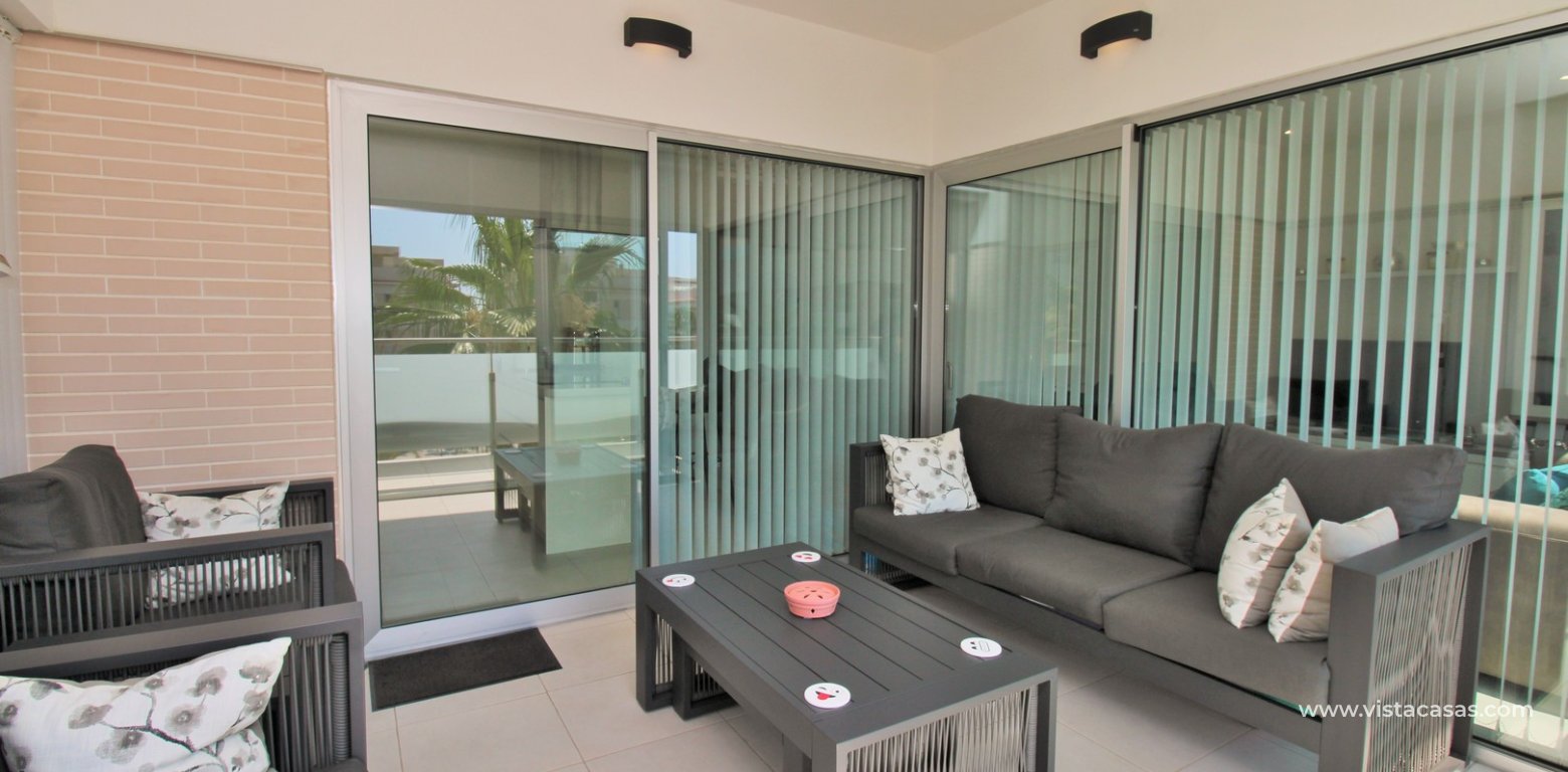 2 Bedroom Pool View Apartment For Sale In Mirador de Villamartin Los Dolses enclosed terrace