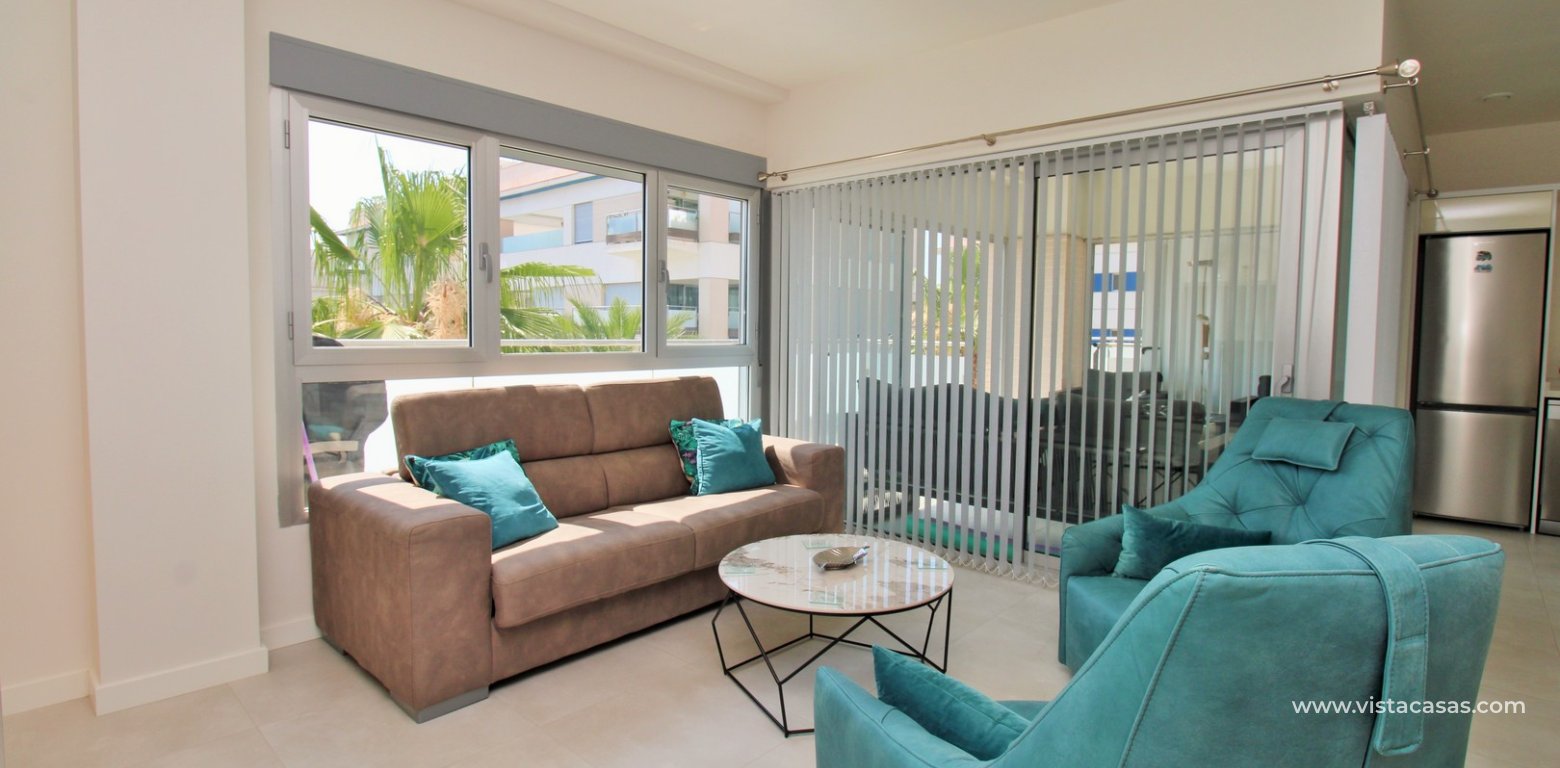 2 Bedroom Pool View Apartment For Sale In Mirador de Villamartin Los Dolses living area