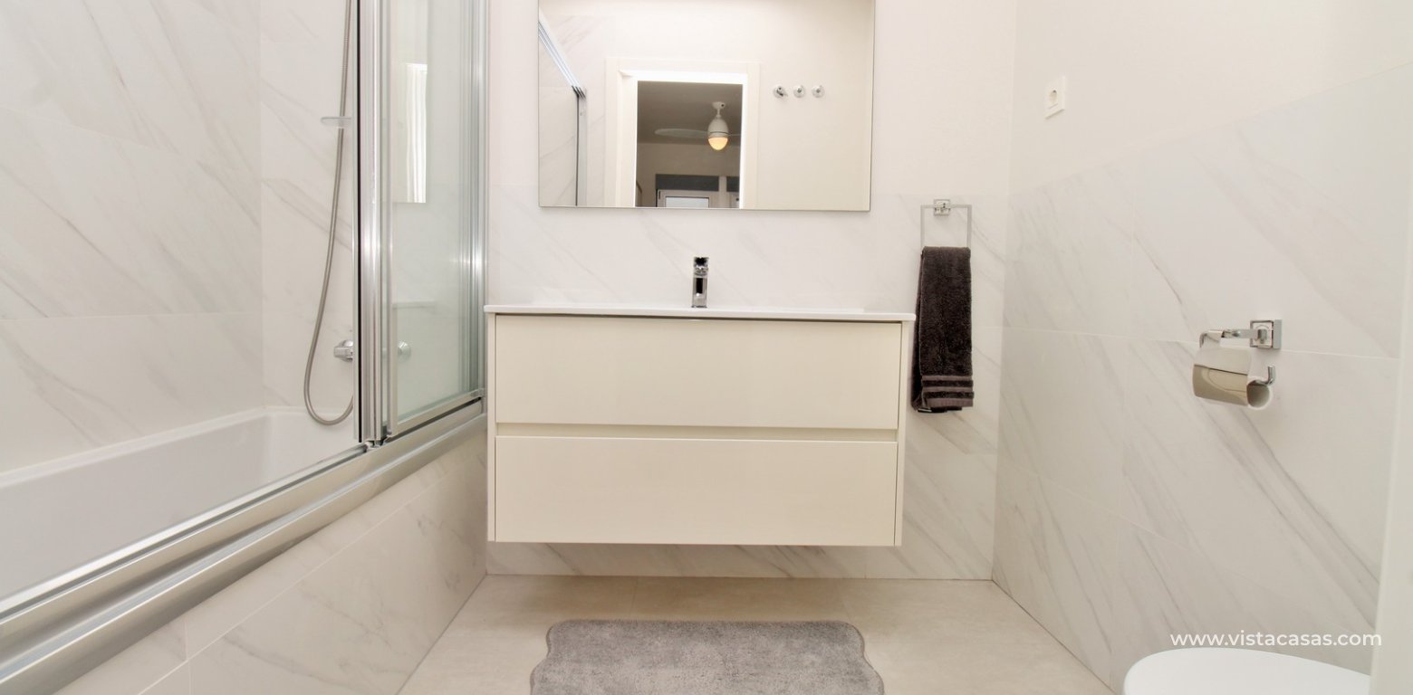 2 Bedroom Pool View Apartment For Sale In Mirador de Villamartin Los Dolses en-suite bathroom