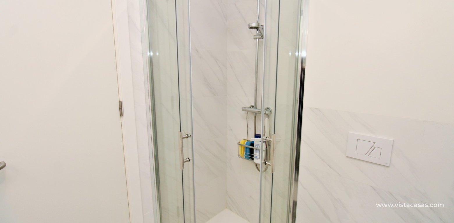 2 Bedroom Pool View Apartment For Sale In Mirador de Villamartin Los Dolses bathroom shower