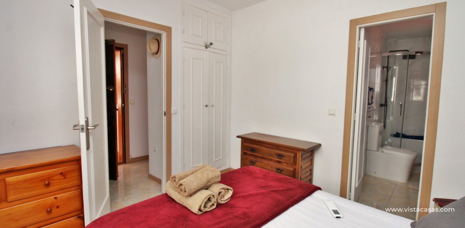Updated 1 Bedroom Apartment in Villamartin Plaza master bedroom fitted wardrobes