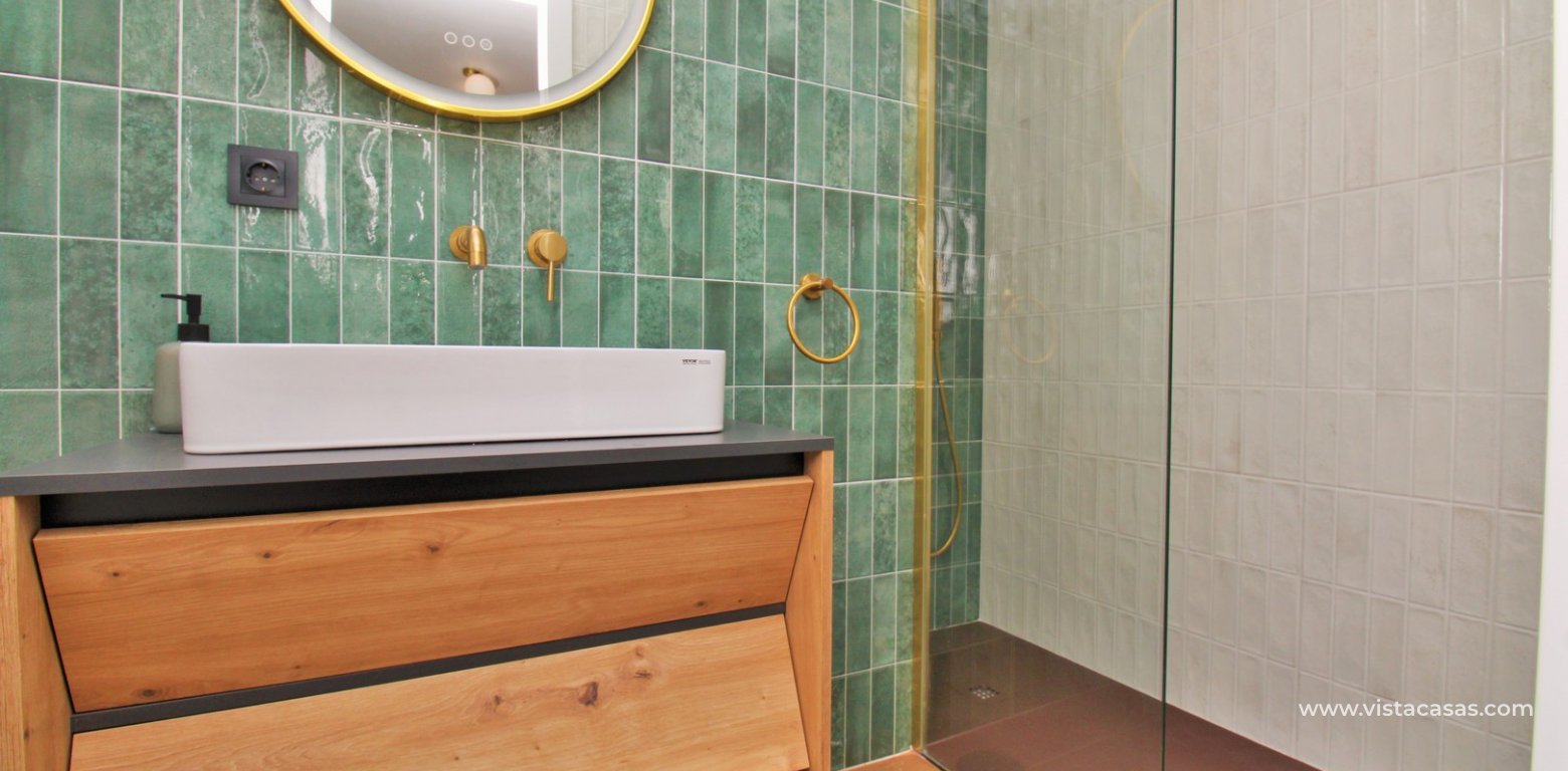 Fully Renovated Apartment 150m from Playa del Puerto For Sale Torre de la Horadada bathroom walk-in shower underfloor heating
