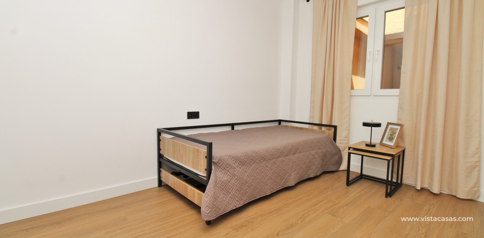 Fully Renovated Apartment 150m from Playa del Puerto For Sale Torre de la Horadada twin bedroom