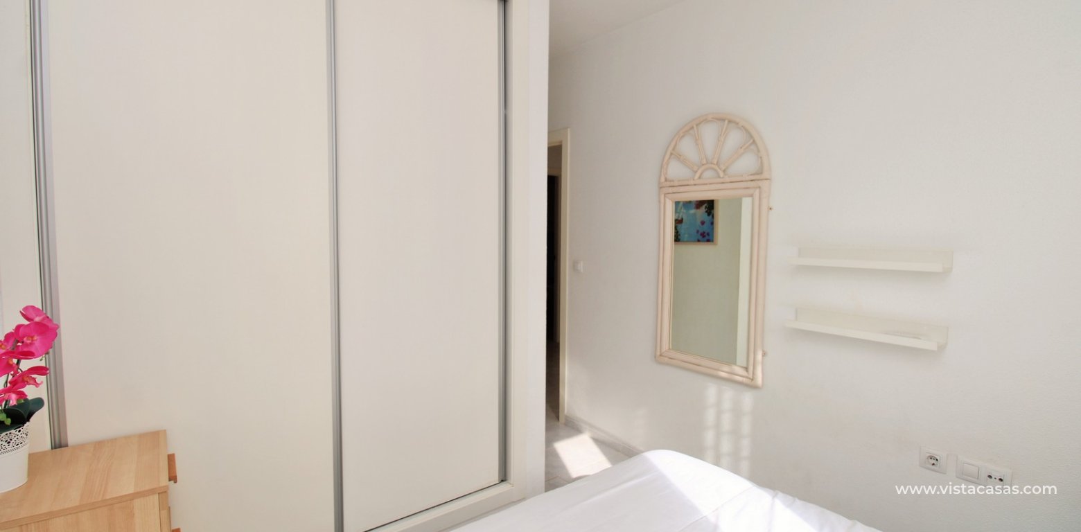 2 Bed Apartment with Solarium For Sale in Panorama Golf Villamartin master bedroom fitted wardrobes