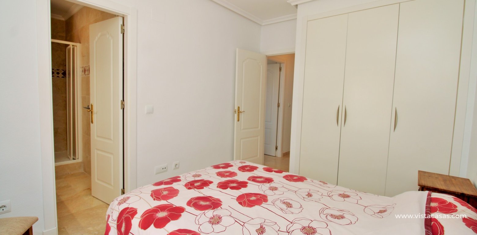2 Bed Apartment For Sale in R12 Pau 8 Villamartin master bedroom fitted wardrobes