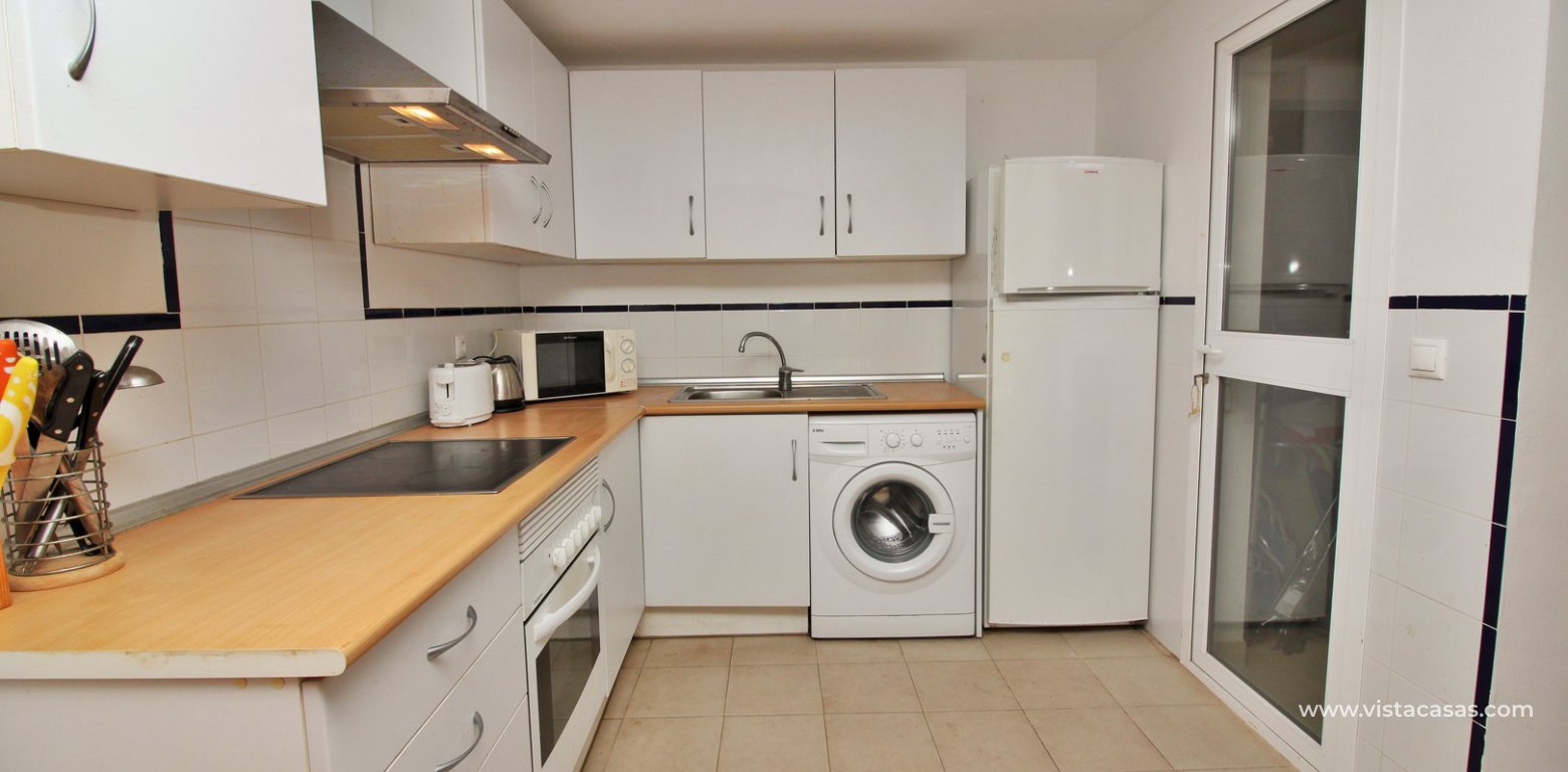 Ground floor apartment for sale El Rincon Playa Flamenca kitchen utility room