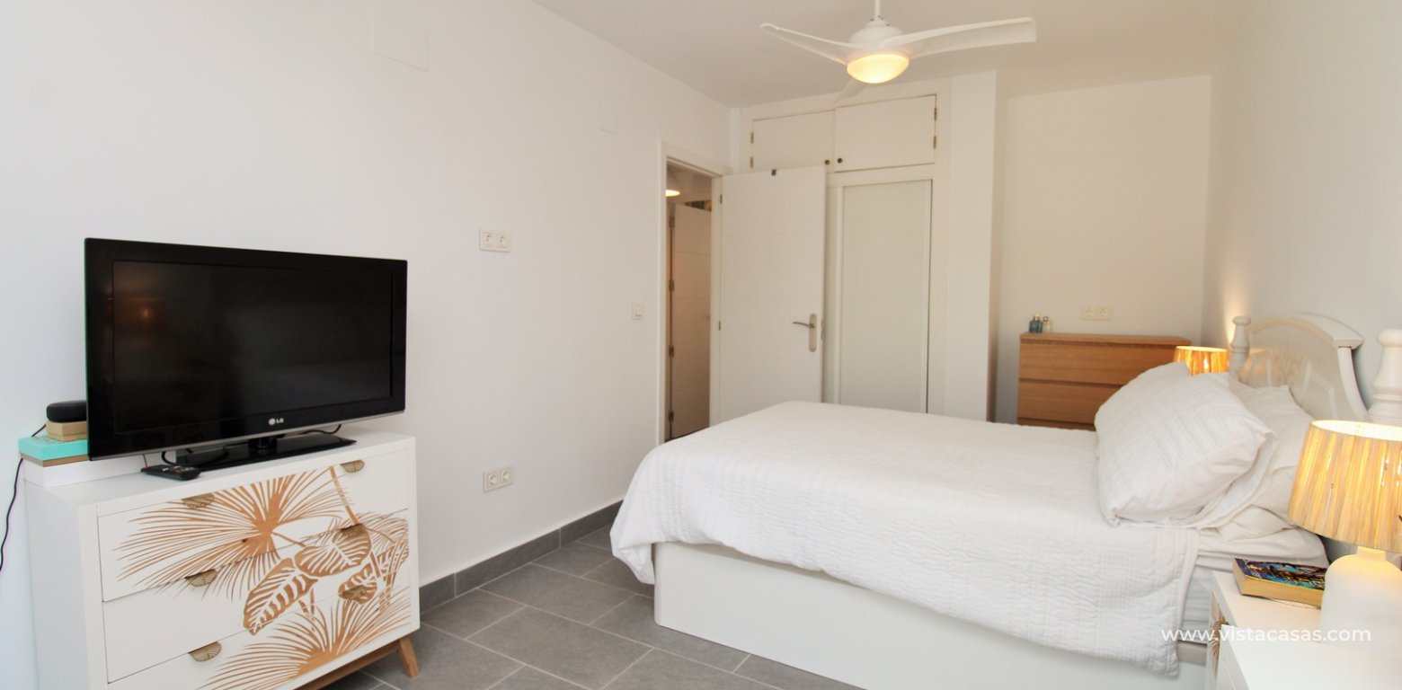 Renovated Lola Bungalow in Valencias Villamartin master bedroom fitted wardrobes