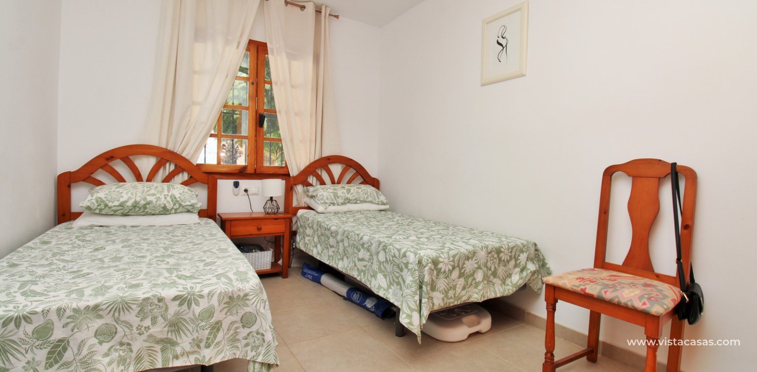 South-Facing Lola Bungalow For Sale in Verdemar III Villamartin twin bedroom