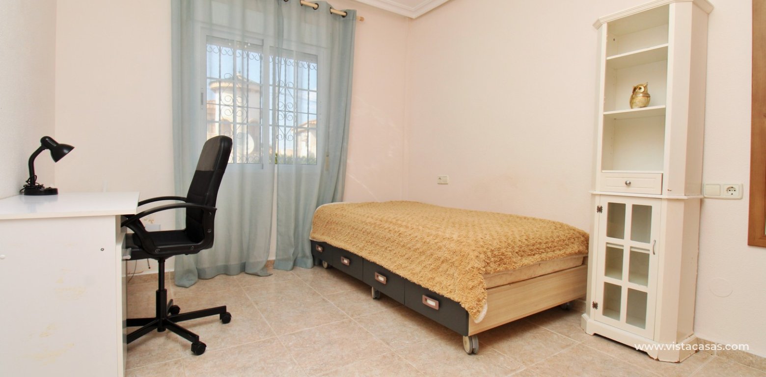 Detached villa with private pool for sale in Zodiaco VI Villamartin downstairs bedroom