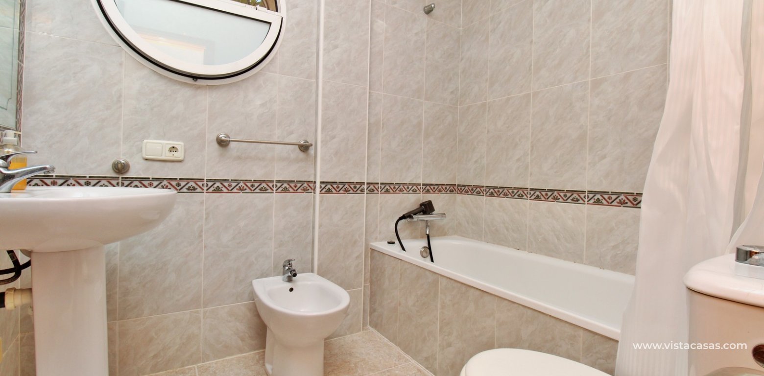Detached villa with private pool for sale in Zodiaco VI Villamartin downstairs bathroom